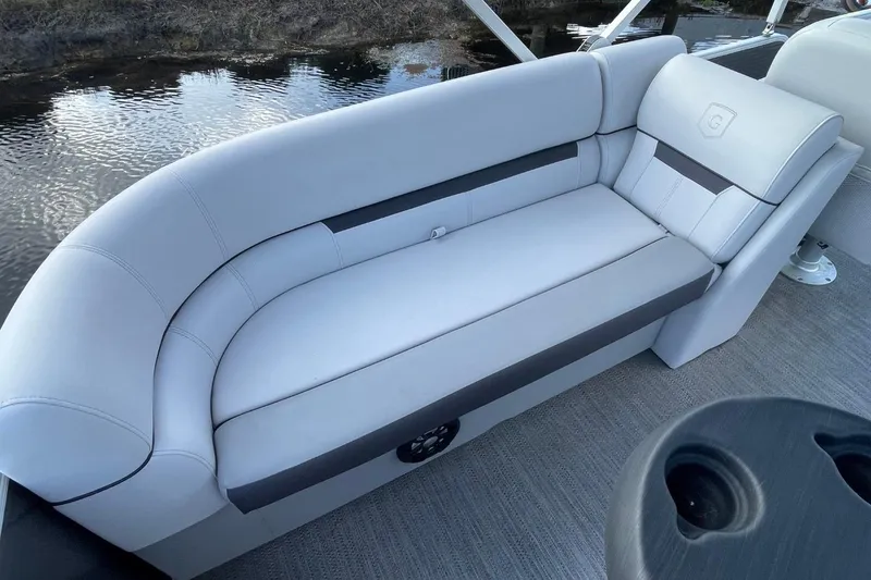 Slide: The Image of 2023 Godfrey Sweetwater 2086 SB boat with sleek, modern seating design. - 8