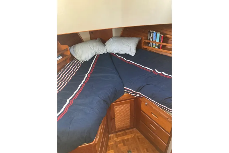 Slide: The Image of Interior of 1983 Grand Banks 42 Classic yacht with wooden cabinetry and cozy furnishings. - 17