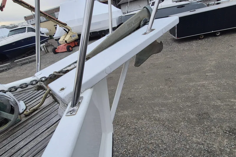 Slide: The Image of 1983 Grand Banks 42 Classic yacht deck with wooden flooring and blue hatch cover. - 36