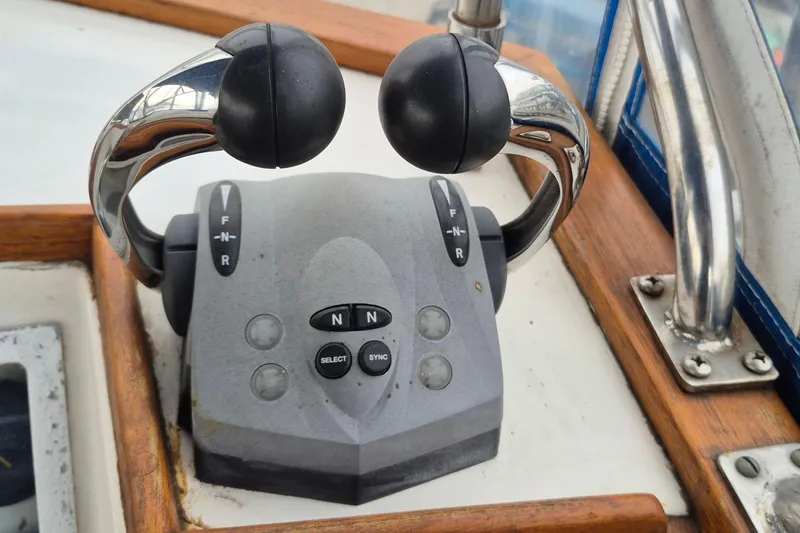 Slide: The Image of Dashboard gauges of a 1983 Grand Banks 42 Classic boat. - 52