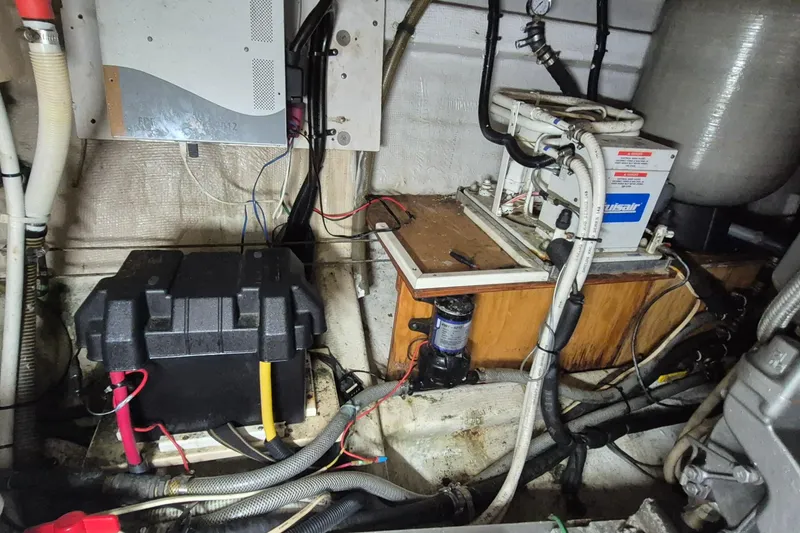 Slide: The Image of 1983 Grand Banks 42 Classic deck with ropes and wooden seating. - 61