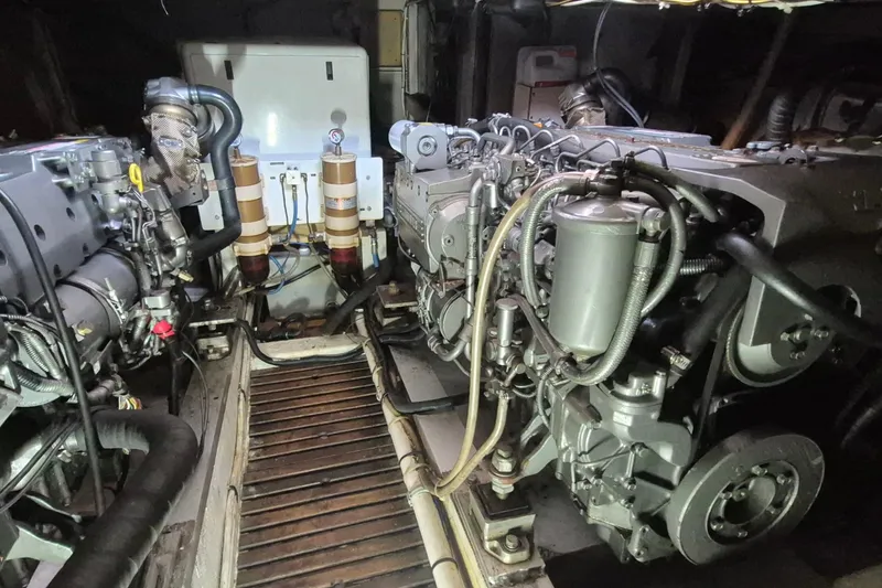 Slide: The Image of Engine room of 1983 Grand Banks 42 Classic with water heater and plumbing. - 66