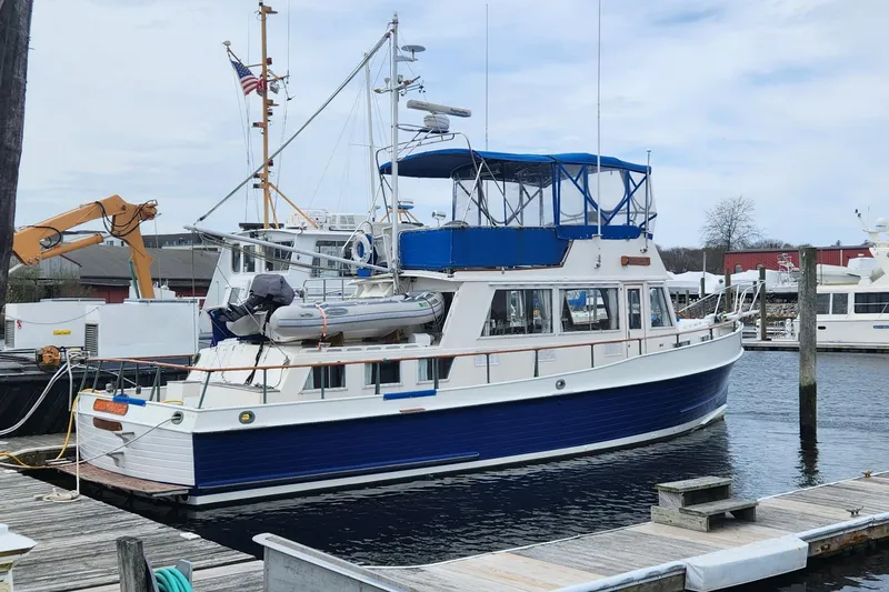 Slide: The Image of 1983 Grand Banks 42 Classic boat on dry dock, showing stern and propeller. - 78