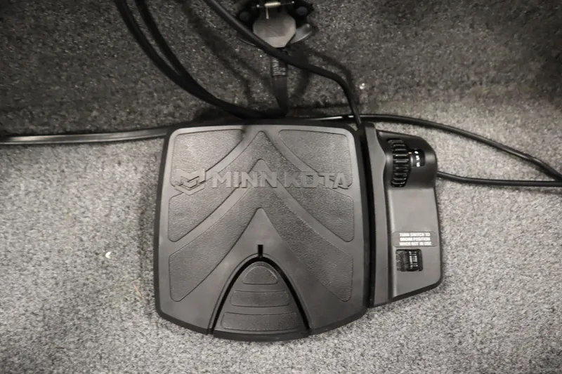 Slide: The Image of Minn Kota foot pedal on 2024 Tracker Pro Guide V-16 WT boat. - 14
