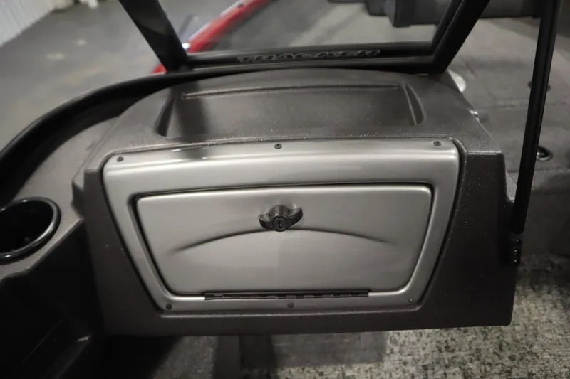 Slide: The Image of 2024 Tracker Pro Guide V-16 WT boat dashboard with storage compartment. - 29