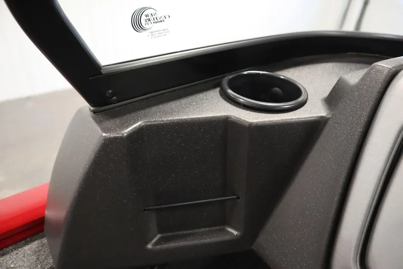 Slide: The Image of 2024 Tracker Pro Guide V-16 WT interior detail with cup holder and windshield. - 31