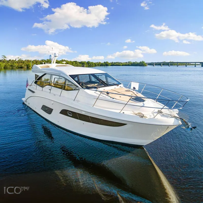 Slide: The Image of 2017 Sea Ray 460 Sundancer yacht cruising on a sunny day. - 1