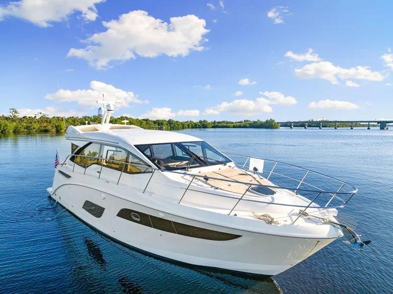 Slide: The Image of 2017 Sea Ray 460 Sundancer yacht cruising on a sunny day. - 2