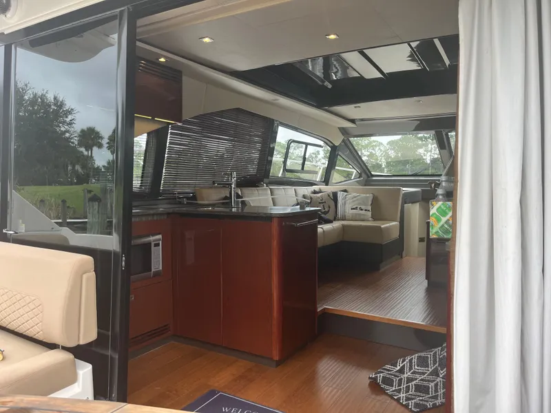 Slide: The Image of Interior of a 2017 Sea Ray Sundancer 460 yacht, luxurious and modern. - 25
