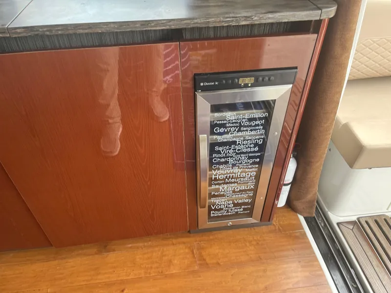 Slide: The Image of Wine cooler in a 2017 Sea Ray Sundancer 460 yacht. - 44