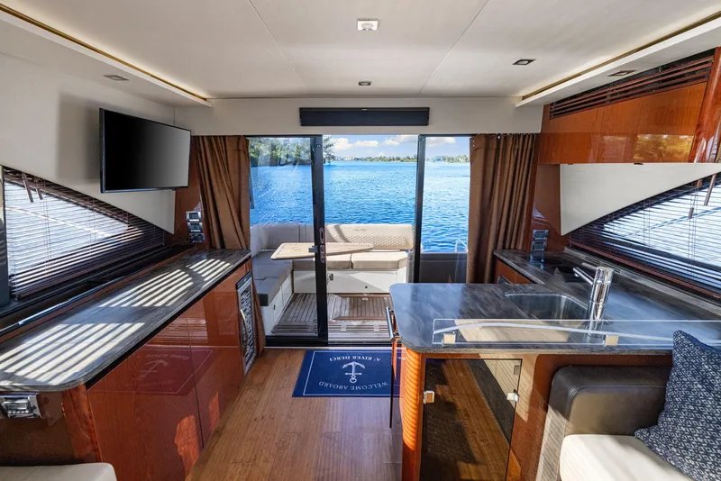 Slide: The Image of Luxurious 2017 Sea Ray 460 Sundancer yacht interior with lake view. - 48