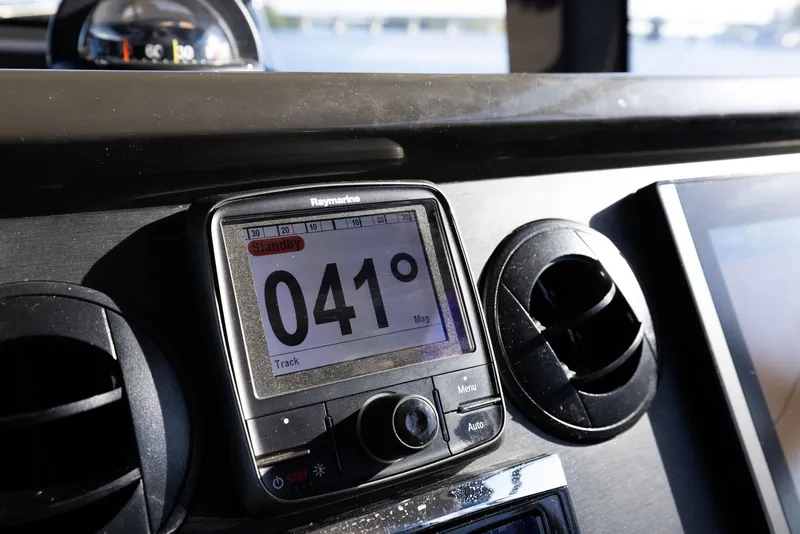Slide: The Image of Close-up of 2017 Sea Ray 460 Sundancer navigation display showing 041 degrees. - 80