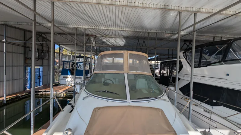 Slide: The Image of 2002 Carver 350 Mariner in covered boat slip. - 16