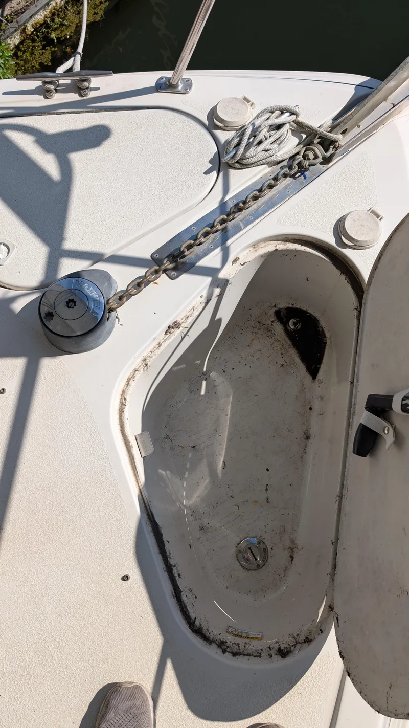 Slide: The Image of Deck view of 2002 Carver 350 Mariner with anchor windlass. - 18