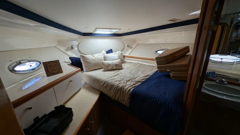Slide: The Image of Interior of 2002 Carver 350 Mariner with cozy bedroom. - 33