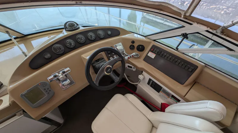 Slide: The Image of Interior view of a 2002 Carver 350 Mariner boat cockpit. - 11