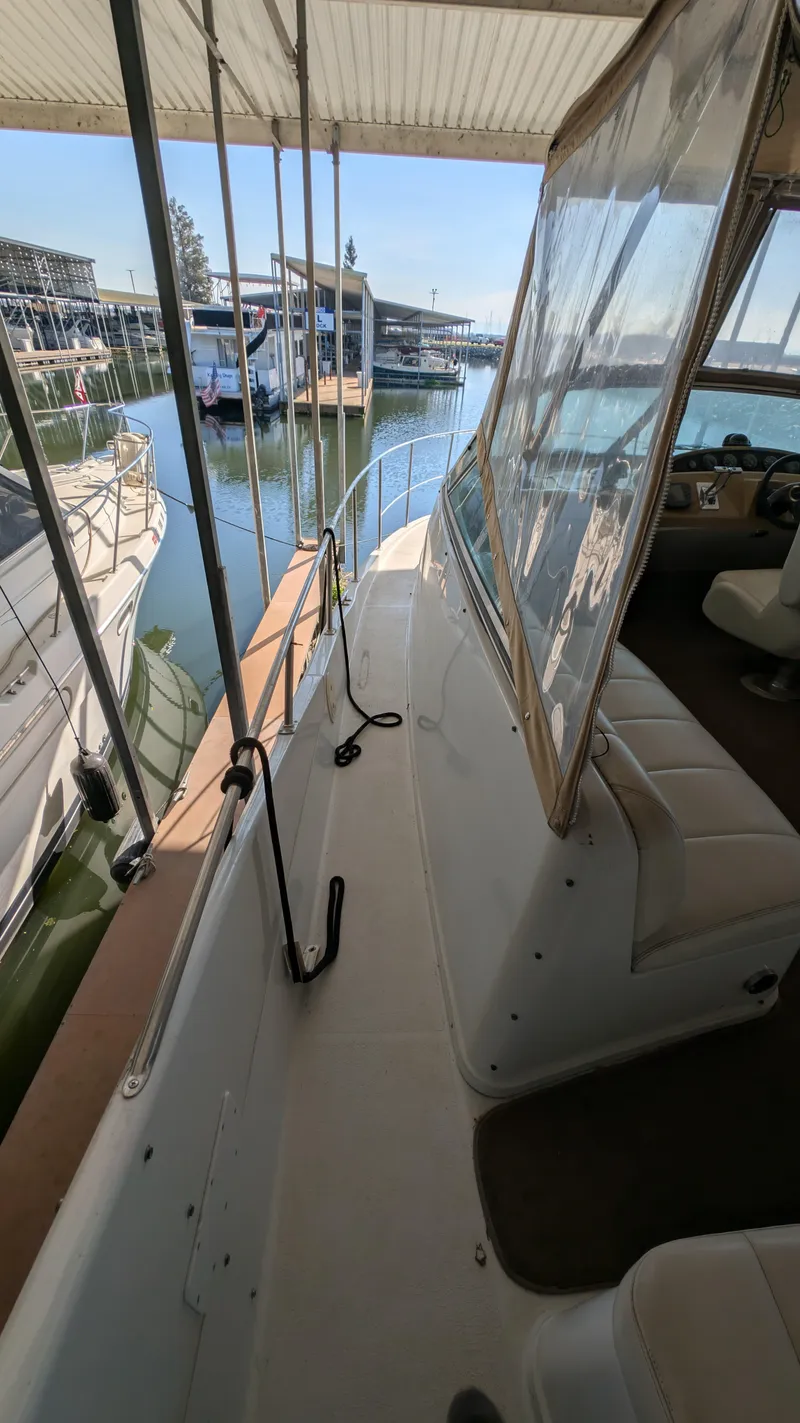 Slide: The Image of 2002 Carver 350 Mariner yacht docked at marina. - 17