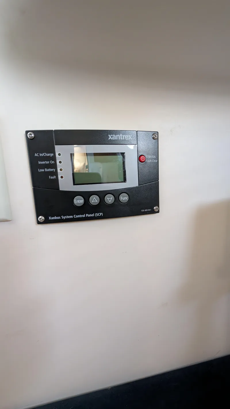 Slide: The Image of Xantrex control panel in Carver 350 Mariner 2002. - 39