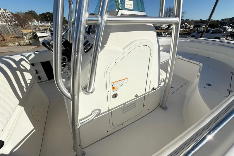 Slide: The Image of 2008 Robalo R240 Center Console boat interior with steering console and seating. - 22