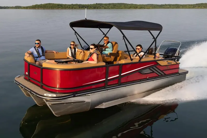 The Image of Manufacturer Provided Image: 2026 SunCatcher Fusion 324SS pontoon boat cruising on a serene lake with passengers. - 0