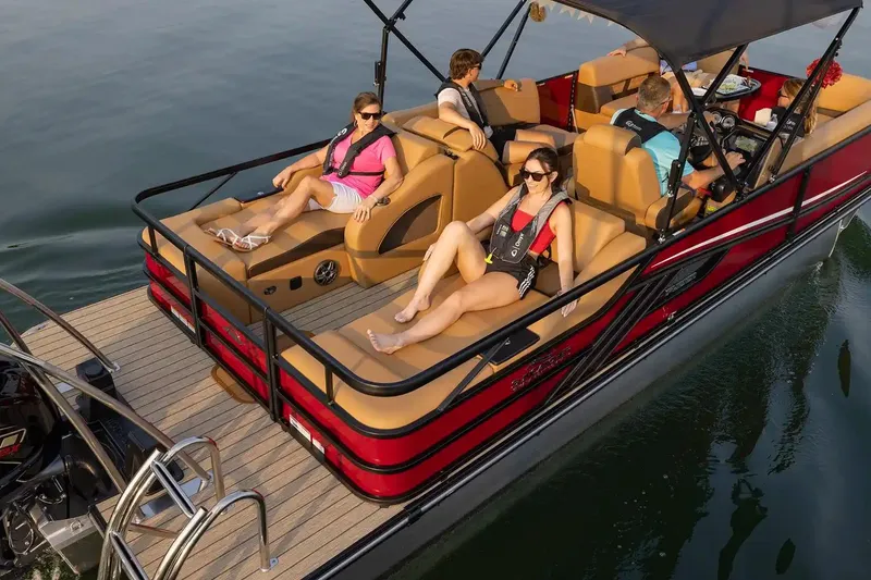 Slide: The Image of 2026 SunCatcher Fusion 324SS pontoon boat with passengers relaxing on deck. - 14