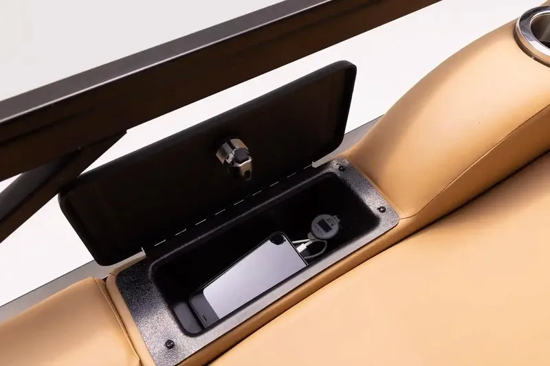 Slide: The Image of Storage compartment in 2026 SunCatcher Fusion 324SS with phone and USB port. - 9