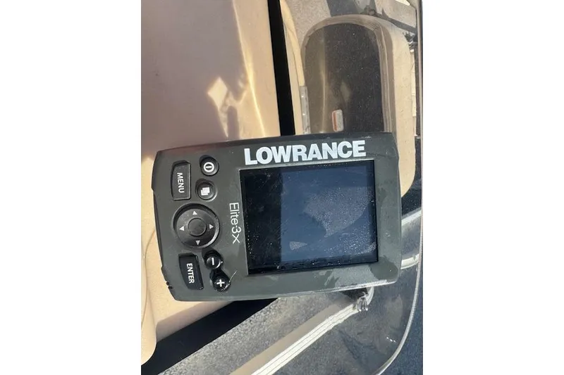 Slide: The Image of Lowrance Elite-3x fish finder on 2015 Sun Tracker Bass Buggy 16 DLX boat. - 16