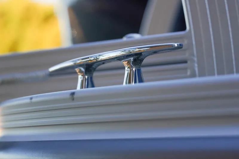 Slide: The Image of Close-up of a 2026 SunCatcher Select 20F boat cleat, showcasing sleek design. - 10