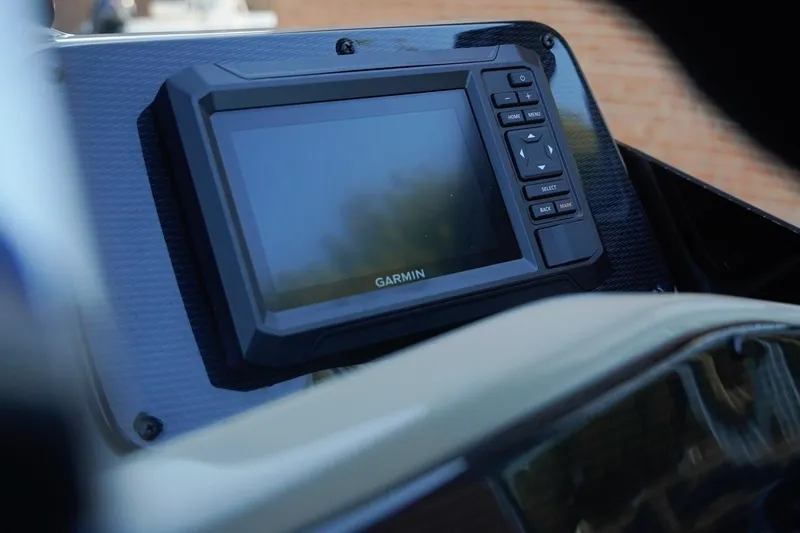 Slide: The Image of Garmin display on 2026 SunCatcher Select 20F boat dashboard. - 16
