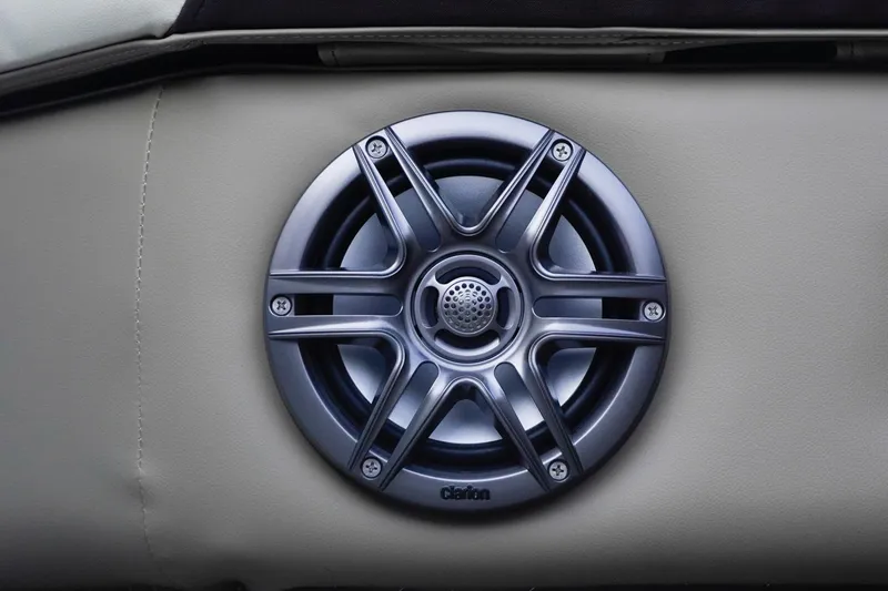 Slide: The Image of Speaker on SunCatcher Select 20F boat, 2026 model, featuring sleek design. - 23