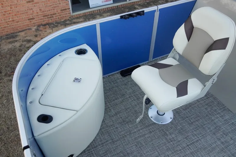 Slide: The Image of SunCatcher Select 20F 2026 boat interior with swivel seat and storage compartment. - 27