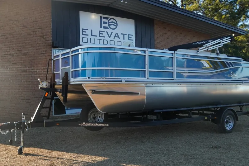 The Image of 2026 SunCatcher Select 20F pontoon boat on trailer at Elevate Outdoor store. - 5