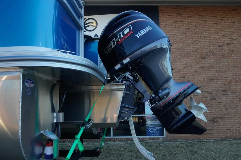 Slide: The Image of 2026 SunCatcher Select 20F boat with Yamaha outboard motor, side view. - 7