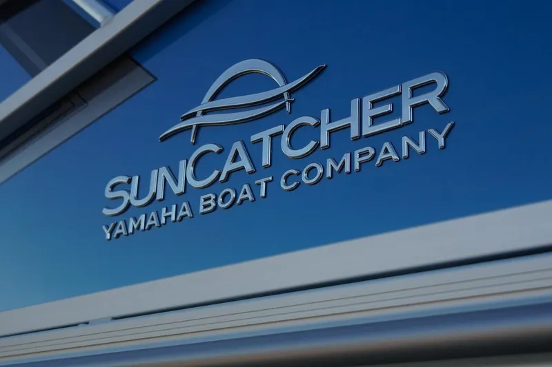 Slide: The Image of SunCatcher Yamaha Boat Company logo on 2026 Select 20F model. - 8