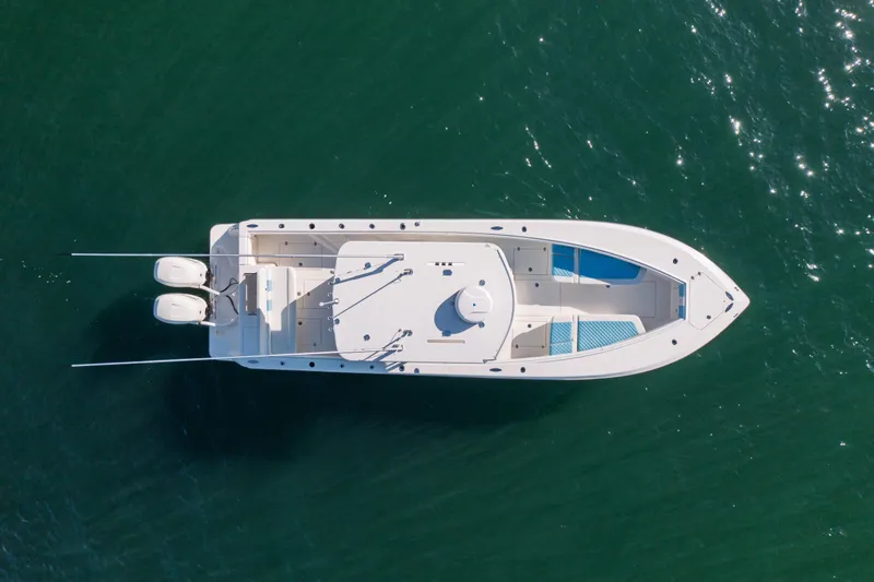Slide: The Image of 2022 SeaVee 340Z boat, aerial view, on calm green water. - 4