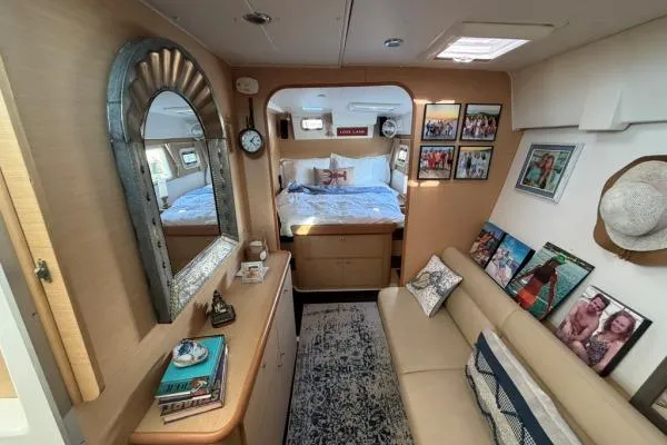 Slide: The Image of Interior of 2008 Lagoon 420 yacht with cozy bedroom and stylish decor. - 16
