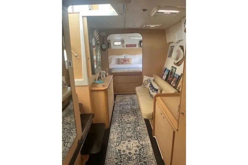 Slide: The Image of Interior of 2008 Lagoon 420 yacht with cozy seating and decorative accents. - 20