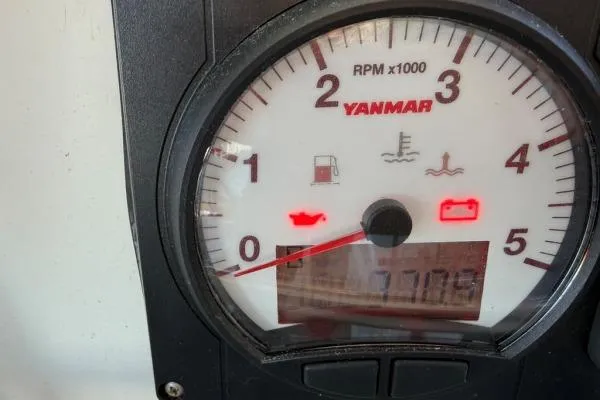 Slide: The Image of Yanmar RPM gauge on 2008 Lagoon 420, displaying engine indicators and digital readout. - 33