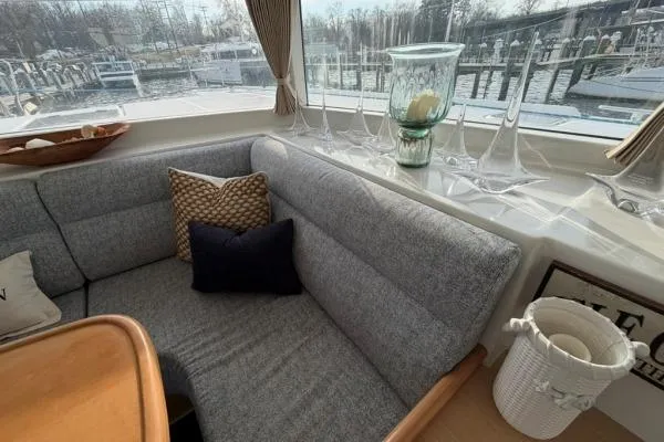 Slide: The Image of Cozy interior of 2008 Lagoon 420 yacht with gray seating and decorative pillows. - 39
