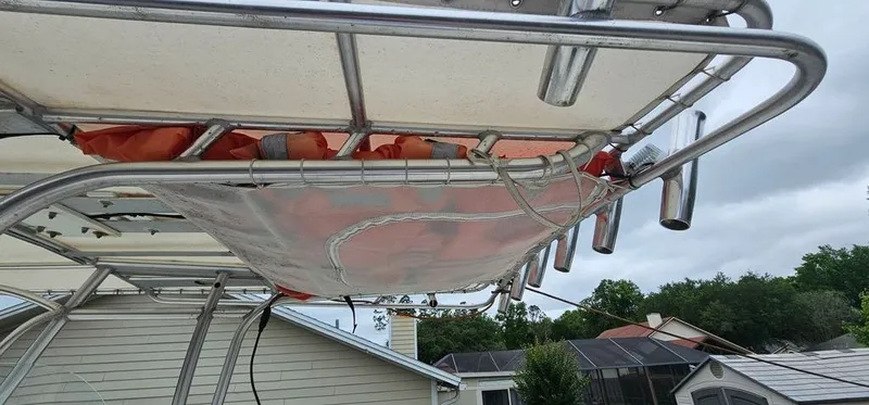 Slide: The Image of Sailfish 2360 CC 2008 boat with T-top and accessories. - 26