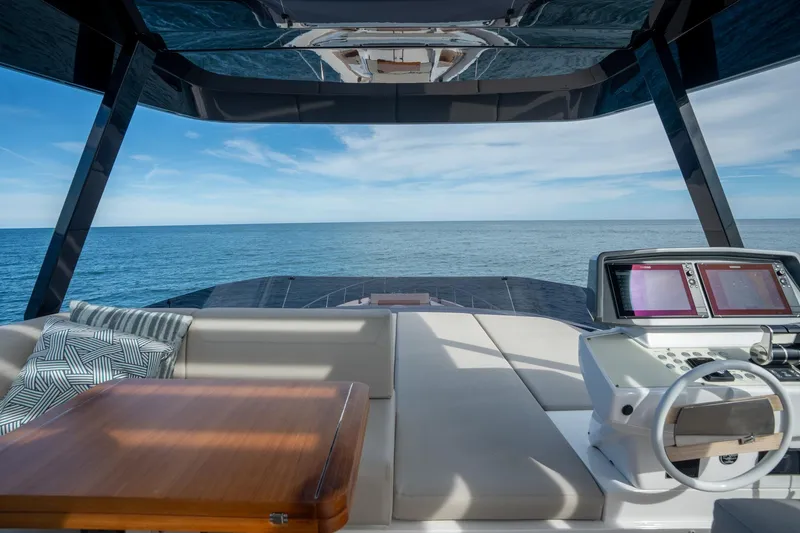 Slide: The Image of Luxurious 2023 Ferretti Yachts 720 interior with ocean view and modern navigation system. - 18