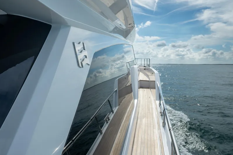 Slide: The Image of 2023 Ferretti Yachts 720 cruising on open sea under clear skies. - 36