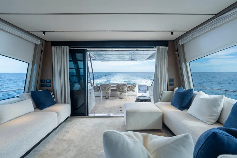 Slide: The Image of Luxurious interior of 2023 Ferretti Yachts 720 with ocean view and elegant seating. - 43