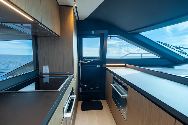 Slide: The Image of Luxurious kitchen interior of 2023 Ferretti Yachts 720 with ocean view. - 49