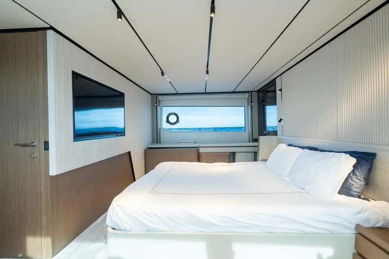 Slide: The Image of Luxurious bedroom interior of 2023 Ferretti Yachts 720 with ocean view and modern design. - 56