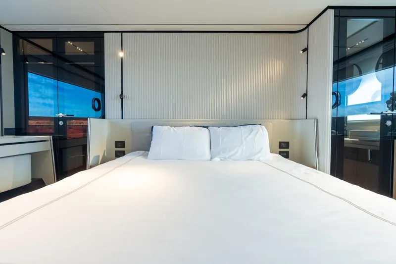 Slide: The Image of Luxurious bedroom interior of 2023 Ferretti Yachts 720 with modern design and ocean view. - 62