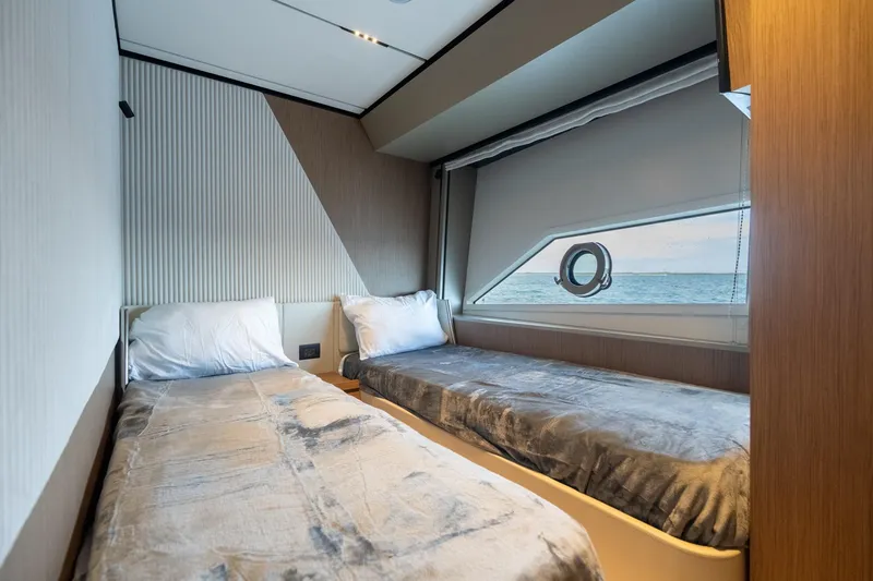 Slide: The Image of Luxurious twin bedroom in 2023 Ferretti Yachts 720 with ocean view. - 67