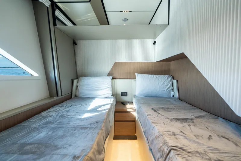 Slide: The Image of Luxurious twin cabin interior on 2023 Ferretti Yachts 720, featuring modern design and comfort. - 68