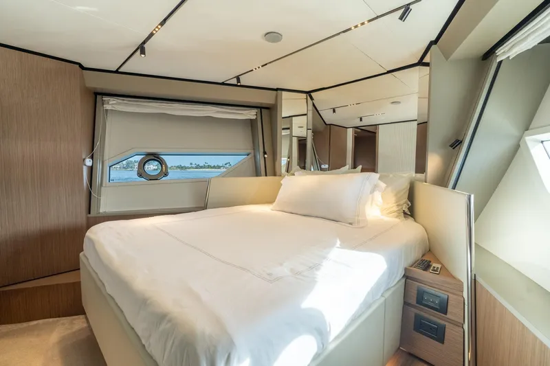 Slide: The Image of Luxurious bedroom interior of 2023 Ferretti Yachts 720 with modern design and elegant furnishings. - 73