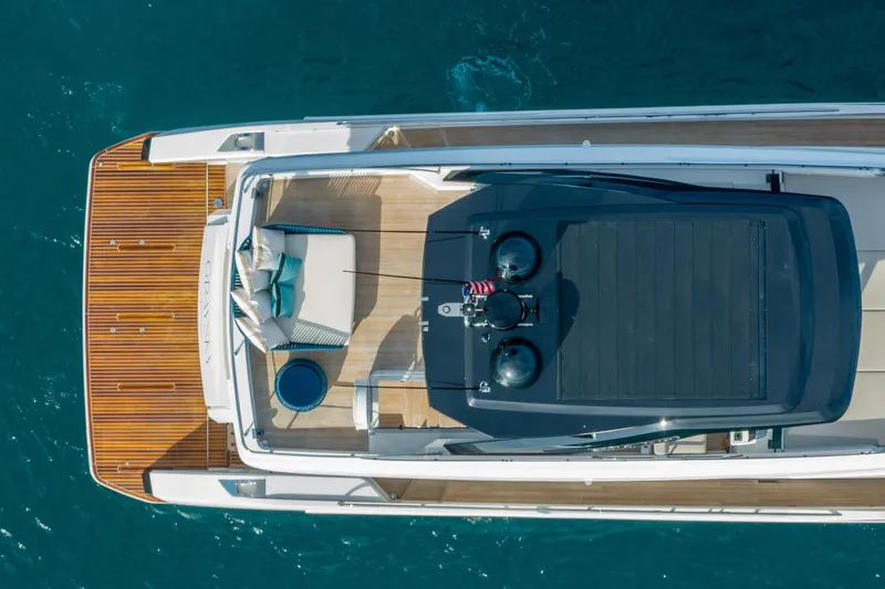 Slide: The Image of Aerial view of 2023 Ferretti Yachts 720 luxury yacht on blue water. - 8